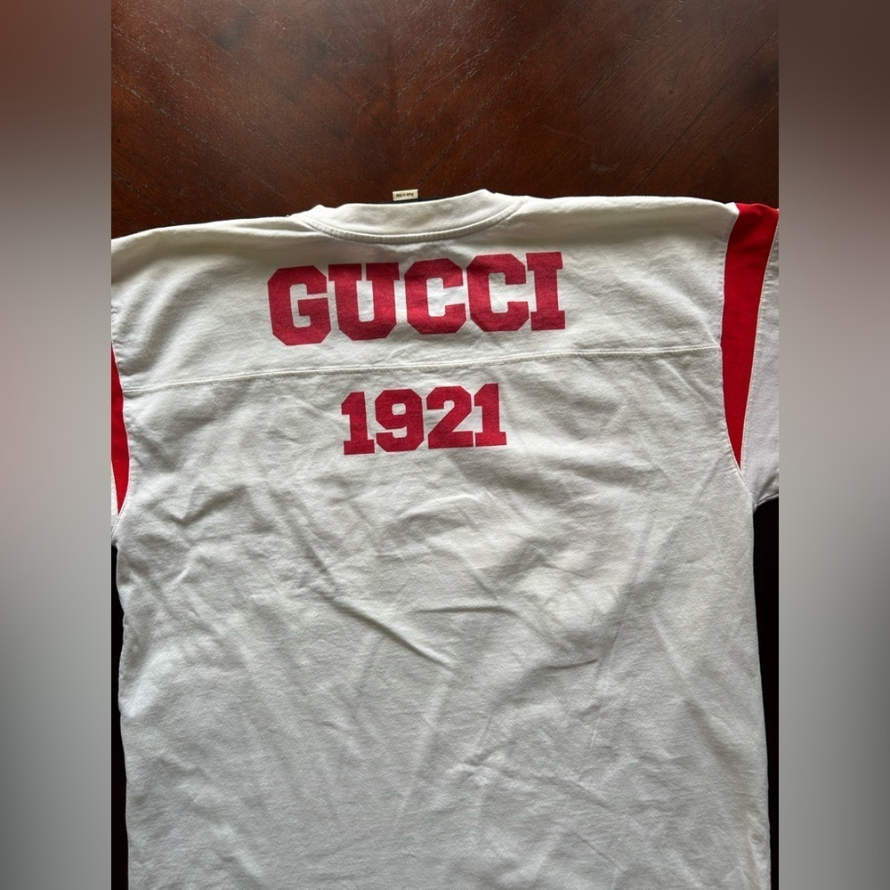 Gucci White Tee with Red Number Design UNISEX
100 music is mine - Picture 9 of 10